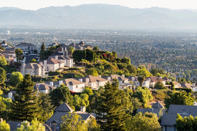 What is a famous suburb of LA ? 